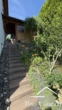 Zugang vom Carport zum Garten - Top EFH mit großer Sonnenterrasse, Carport und Souterrain. Ruhige Lage in Wasserburg/Günzburg
