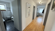 Flur WHG EG - Gepflegtes Dreifamilienhaus in Toplage- Modernisiert und mit durchdachten Grundrissen