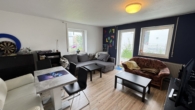 Wohnbereich mit Zugang zur Terrasse WHG EG - Gepflegtes Dreifamilienhaus in Toplage- Modernisiert und mit durchdachten Grundrissen