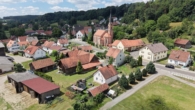 Luftbild Nord/Ost - Vermietetes Einfamilienhaus – 3,8 % Bruttorendite und Potenzial für einen weiteren Bauplatz