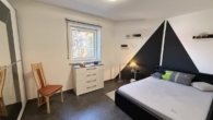 Kinderzimmer - Top gepflegte 3-Zimmer-Wohnung im 1. OG mit Südbalkon & Blick ins Grüne, TG-Stellplatz inklusive