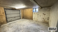 Garage KG - Einfamilienhaus mit Charme, einem großem Garten und einer Garage im Untergeschoß