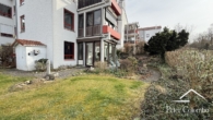 Gartenansicht - Seltene Gelegenheit- Schicke 3 Zimmer Gartenwohnung mit Wellnessbereich, 2 Keller und TG Stellpl.