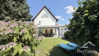Gartenansicht zum Haus - Liebevoll renoviertes Einfamilienhaus mit Wintergarten und traumhaftem Garten in Schwabmünchen